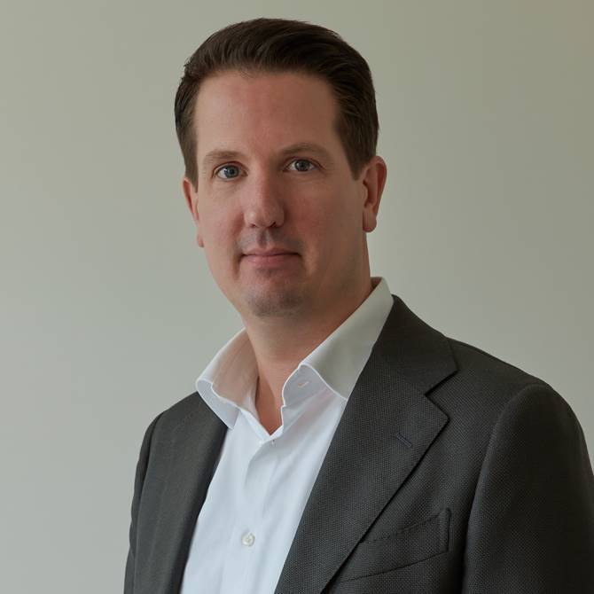 Professional headshot of Bart Van De Brug, the Amsterdam Regional General Manager at Lore Group hotels and restaurants.