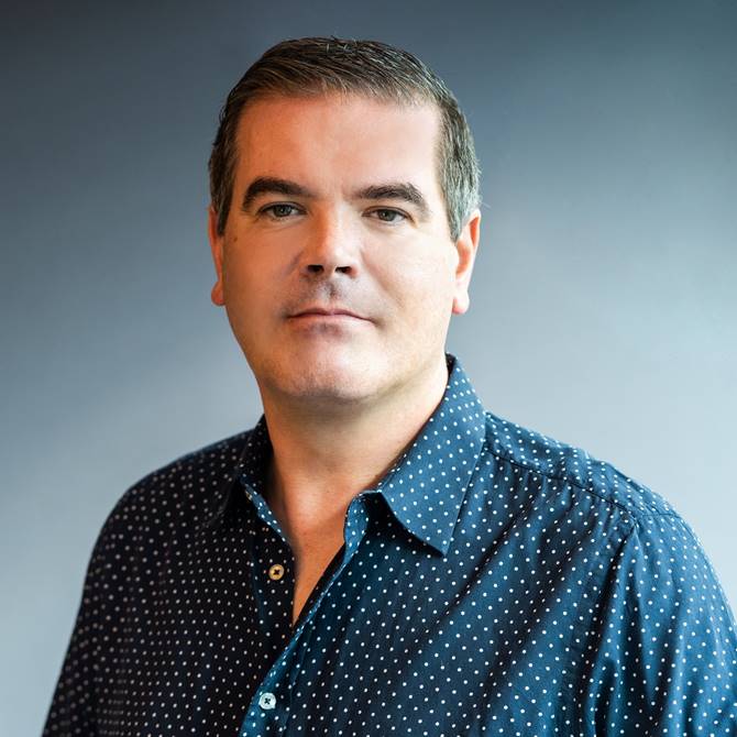 Professional headshot of David Taylor, the CEO of Lore Group, the luxury hotel and restaurant group in Europe and the USA.