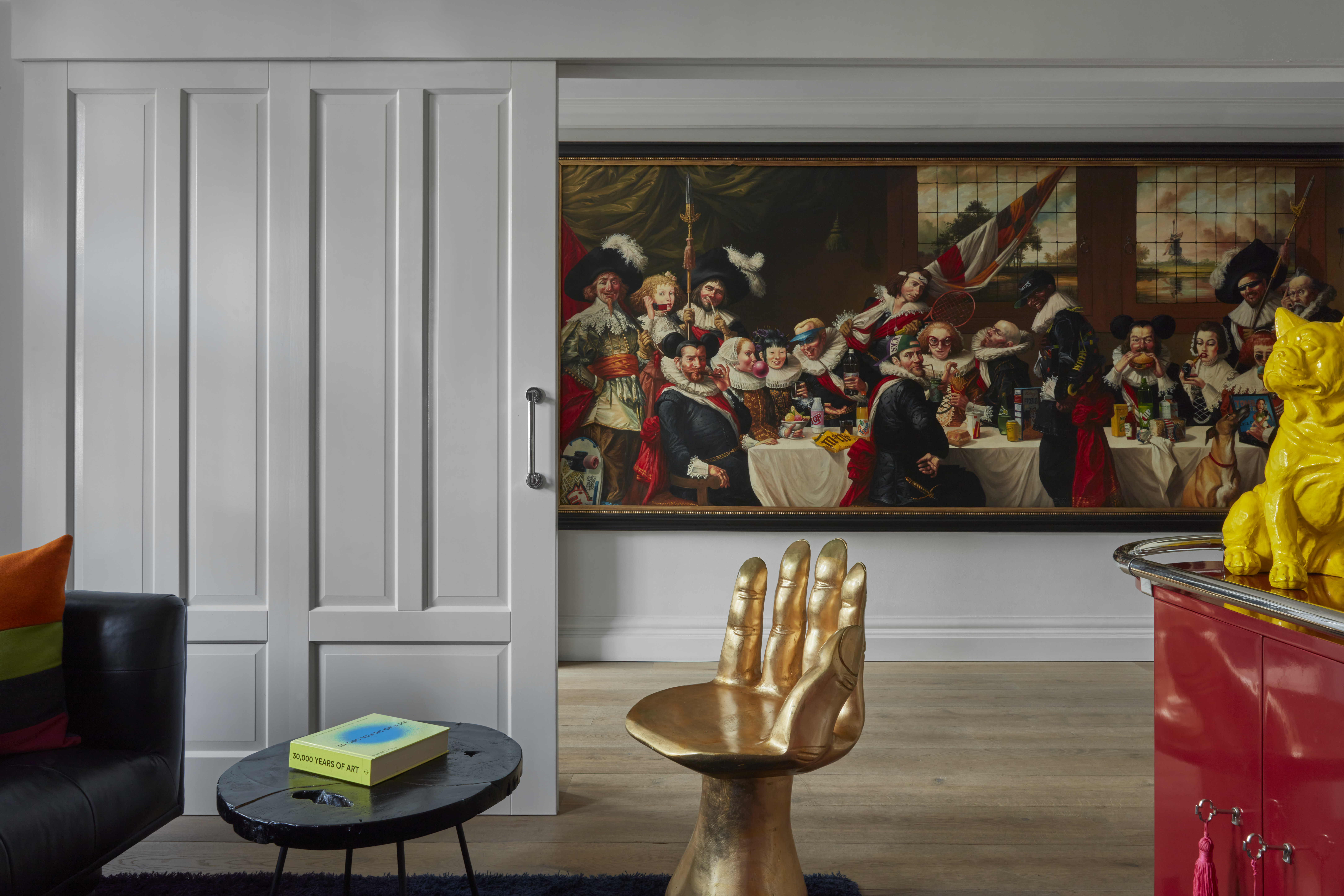 Playful classical painting with figures in historical dress and modern pop items at the Pulitzer Amsterdam hotel.