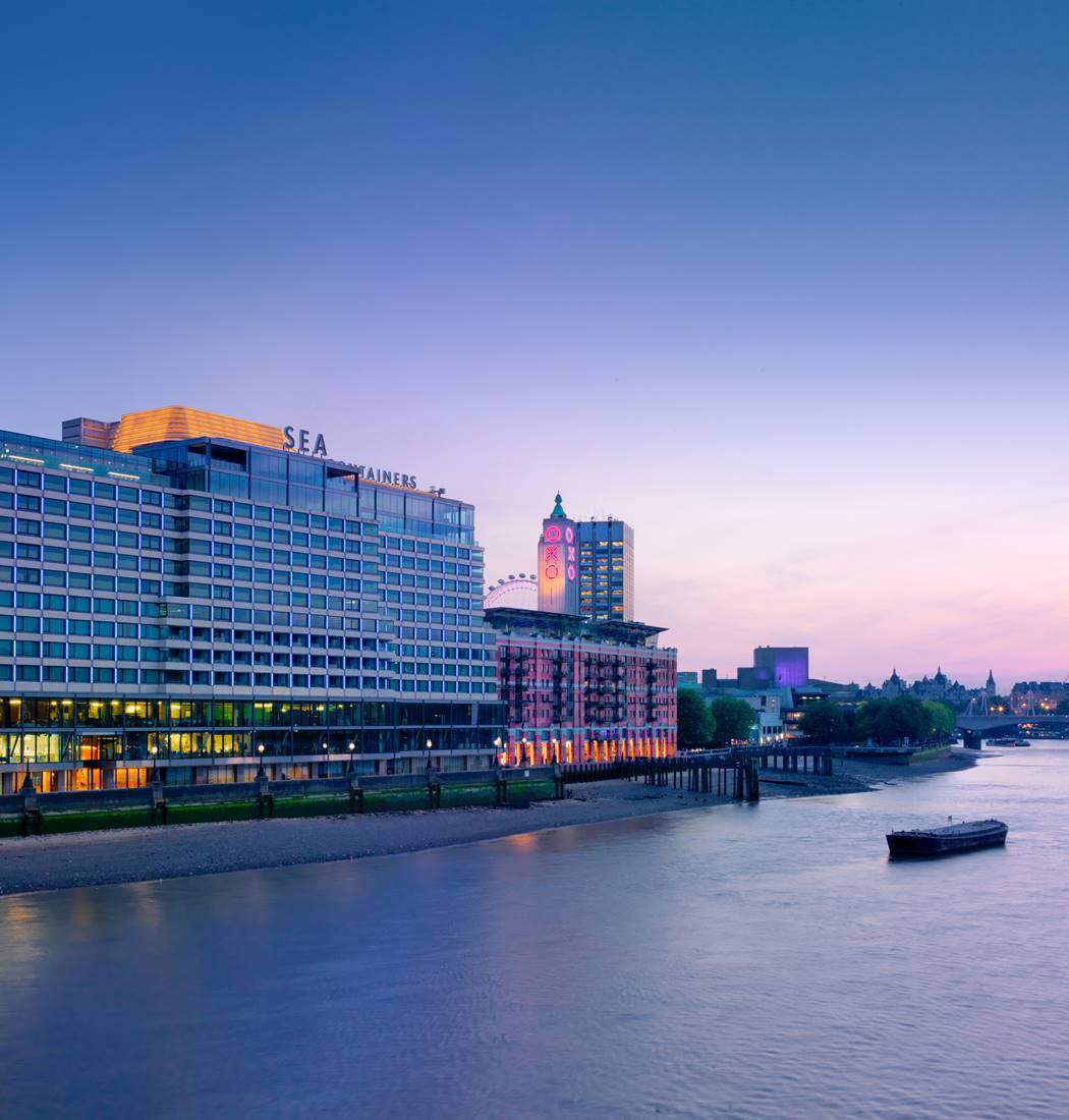 Exterior view of the modern Sea Containers London hotel building with unique architectural design.